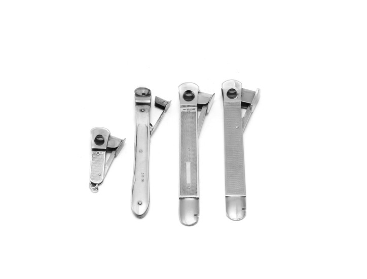 Three silver-mounted cigar cutters