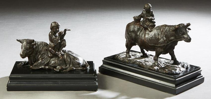 Two Chinese Patinated Bronze Cows, 20th c., with