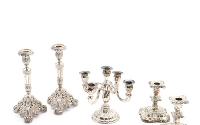 Two pairs of sterling silver candlesticks and a German silver candelabra with five branches. Various makers. H. 14–24 cm. (5)