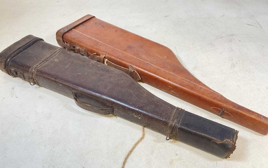 Two vintage moulded leather leg of mutton gun cases.Condition Report...