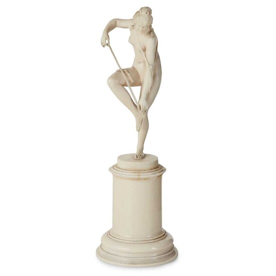 Y FRENCH CARVED IVORY FIGURE OF VENUS REMOVING HER SANDAL LATE 19TH CENTURY