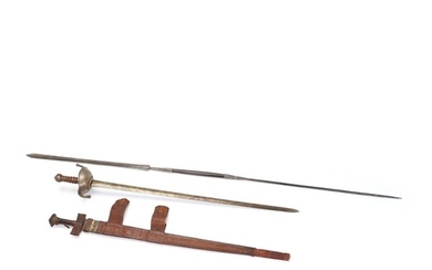 A Spanish type sword, a Tuareg sword and a Masai spear.