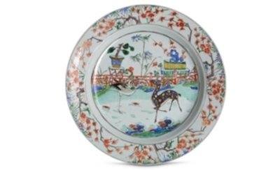A LARGE CHINESE FAMILLE VERTE 'DEER AND CRANE' DISH.