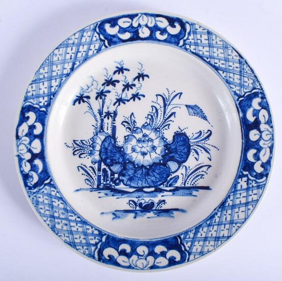 18th c. Bow plate painted in blue with a large flowers