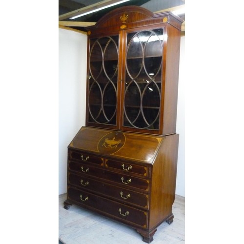 19th C mahogany bureau bookcase with arched top above two gl...