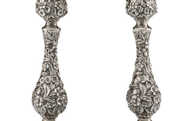 A Pair of S. Kirk & Son Repoussé Silver Weighted Candlesticks (1925-1932)