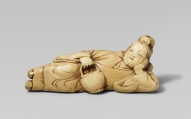 A good ivory netsuke of a reclining servant o ...