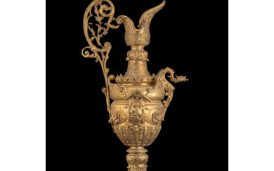 A gilt bronze ewer on marble base. Early 20th-century (h. cm 52) (defects)
