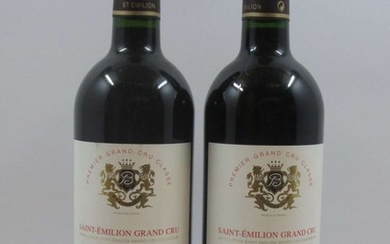 12 bouteilles CHÂTEAU BEAUSEJOUR BECOT 1999 1er GCC (B) Saint Emilion (étiquettes fanées)