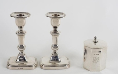 A pair of 18th Century style silver candlesticks