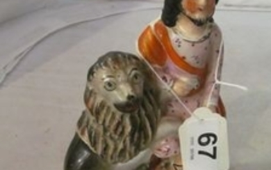 A 19th Century Staffordshire figure group Daniel and the Lion
