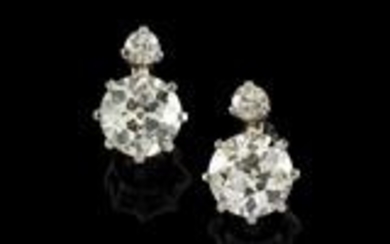 A pair of diamond earrings, total weight c. 2.90 ct