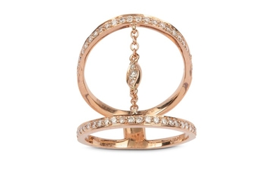 A diamond-set dress ring Of wide bifurcated design,...