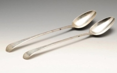 A pair of early George III silver basting spoons, in