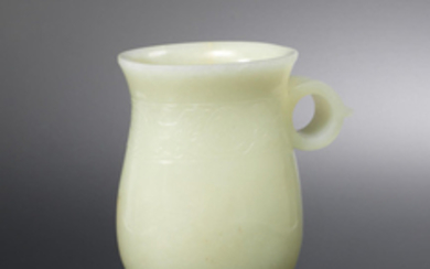 A pale green jade pouring vessel, zhi