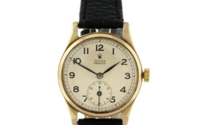 ROLEX - a gentleman's Precision wrist watch. 9ct yellow