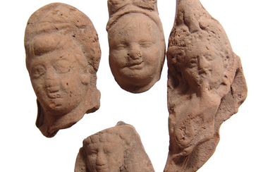 A lot of 4 Romano-Egyptian terracotta heads