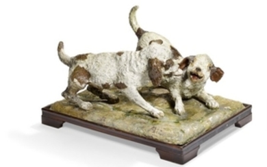 Theodor Philipsen: Two puppies. 1906. Unsigned. Figurine of colour glazed fired clay. H. 36 cm, L. 60 cm, W. 45 cm.