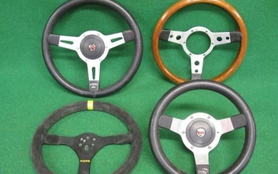 Three Mountney dished steering wheels - 14'', 13'' and 12'' in dia together with a Momo - 13.5'' in dia