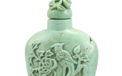 TURQUOISE SNUFF BOTTLE In spade shape, with relief bird and flower design. Height 3.4". Conforming stopper.