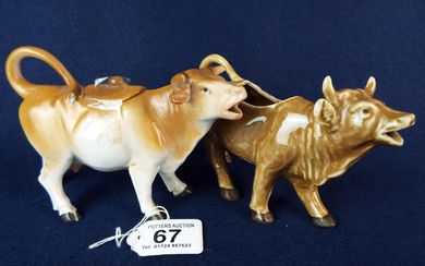 Two old continental ceramic cow creamers