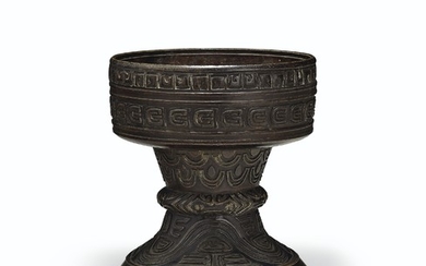 A BRONZE ARCHAISTIC FOOD VESSEL, DOU, QIANLONG CAST SIX-CHARACTER SEAL MARK AND OF THE PERIOD (1736-1795)