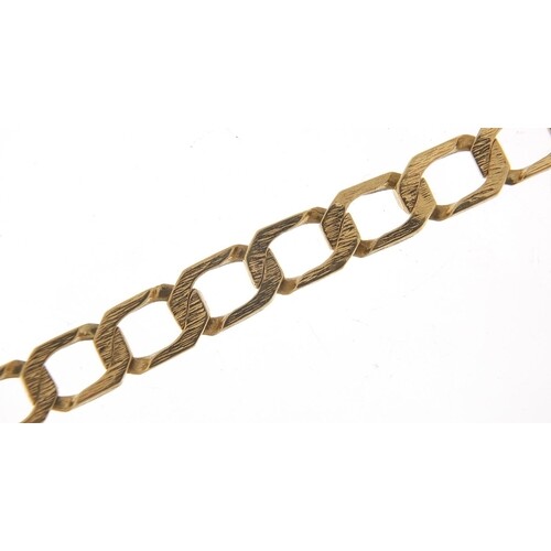 9ct gold curb link bark design bracelet, 20cm in length, 13....