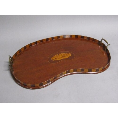 A 19c mahogany kidney shaped galleried two handled tea tray ...