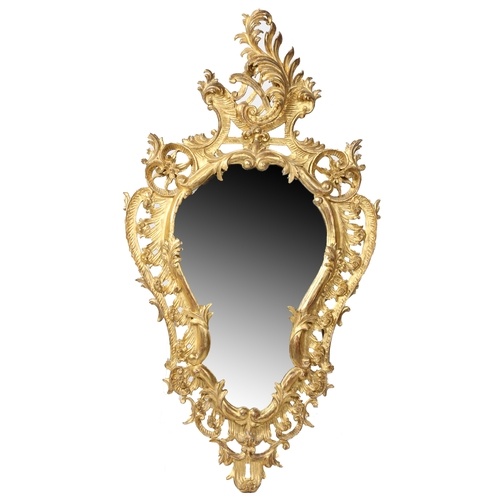 A 19th century Roccoco gilt wall mirror, having a ornately c...