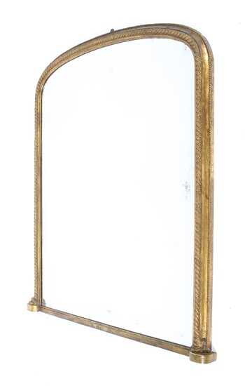 A 19th century giltwood overmantle mirror, of arched rectangular form with rope twist border