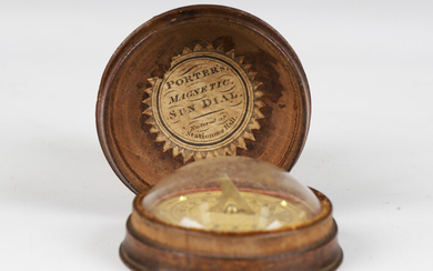 A 19th century treen cased pocket sundial, the lid interior bearing paper label, detailed 'Port