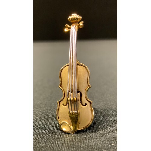 A 9ct gold Violin brooch, white strings, yellow gold body, m...