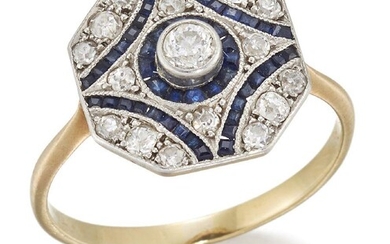 A Belle Epoque diamond and sapphire cluster ring, the pave-set diamond, square-shaped bezel with calibre sapphire geometric detail, and central collet-set single old-brilliant-cut diamond, in platinum and gold mount with pierced gallery, c.1915...