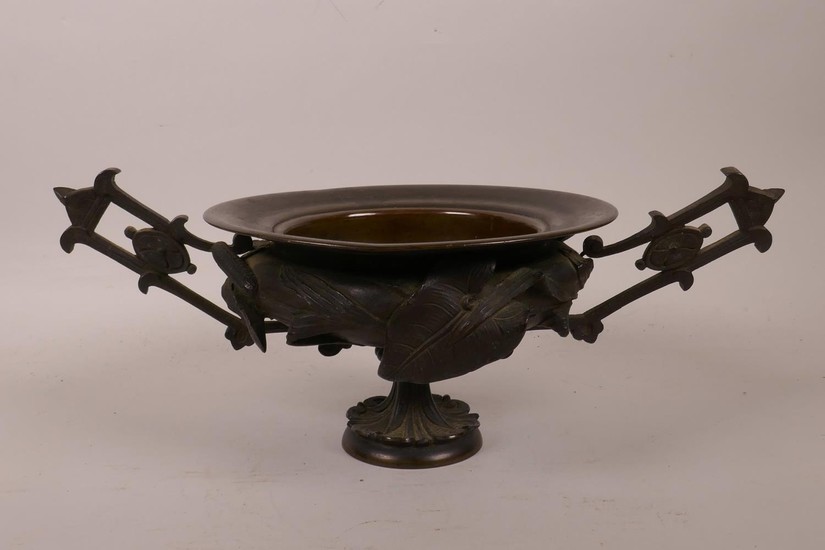 A C19th French bronze two handled censer/urn with raised bar...