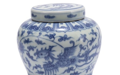 A CHINESE BLUE AND WHITE PHOENIX JAR WITH COVER