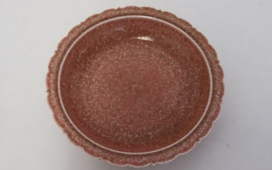 A Chinese red glazed porcelain plate