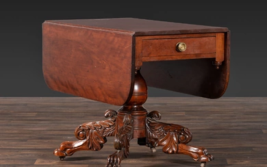 A Classical Highly Carved Cherrywood Drop-Leaf Dining Table