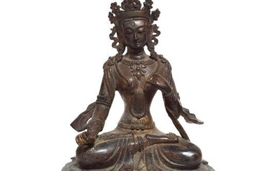 A Copper Alloy Figure of Tara, Nepal, 18th/19th century, sitting...