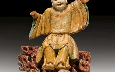A FINELY CARVED SOAPSTONE FIGURE OF LIU HAI AND HIS TOAD.