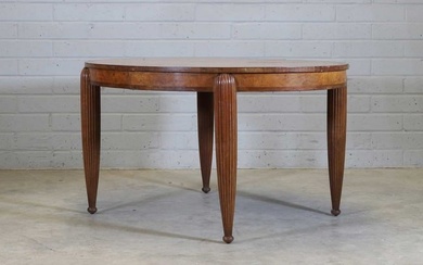 A French Art Deco walnut and mahogany dining table