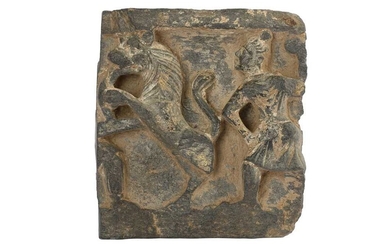 A GREY SCHIST CARVED FRAGMENT WITH A RAMPANT LION Ancient region of Gandhara, 2nd - 3rd century