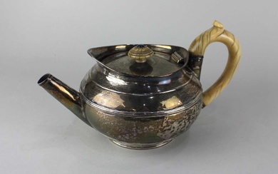 A George III silver circular tea pot