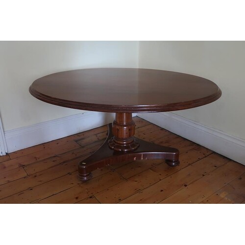 A George IV mahogany supper table, the oval top above bell s...