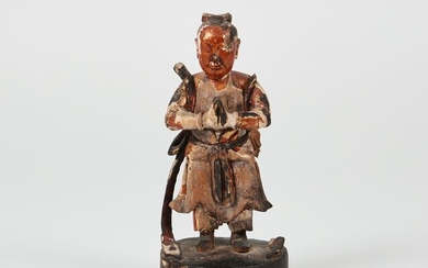 A Japanese gilt, polychromed carved wood figure