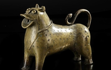 A MUGHAL BRASS INCENSE BURNER IN THE FORM OF A LION, INDIA, 17TH CENTURY