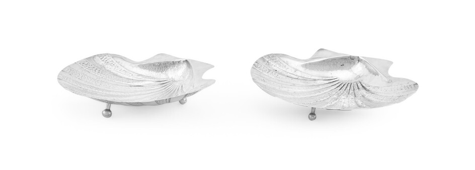 A PAIR OF COLOMBIAN SILVER COLOURED SHELL DISHES, STAMPED T.R.P