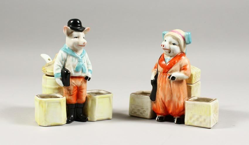 A PAIR OF CONTINENTAL PORCELAIN MR. AND MRS. PIG