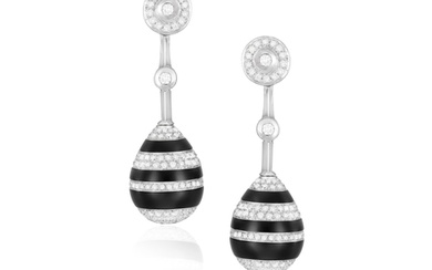 A PAIR OF DIAMOND AND ONYX EARRINGS Of opposing design, eac...