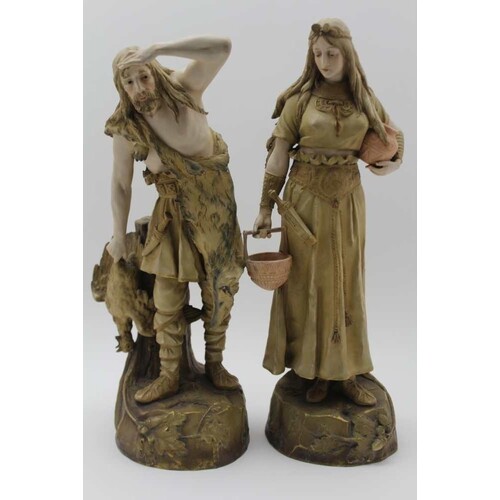 A PAIR OF LATE 19TH CENTURY AUSTRIAN CERAMIC FIGURES by Erns...