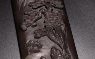 A QIYANG STONE ARMREST CARVED WITH FIGURE